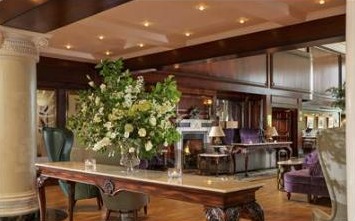 Powerscourt Hotel - Lobby, fireplace & flowers